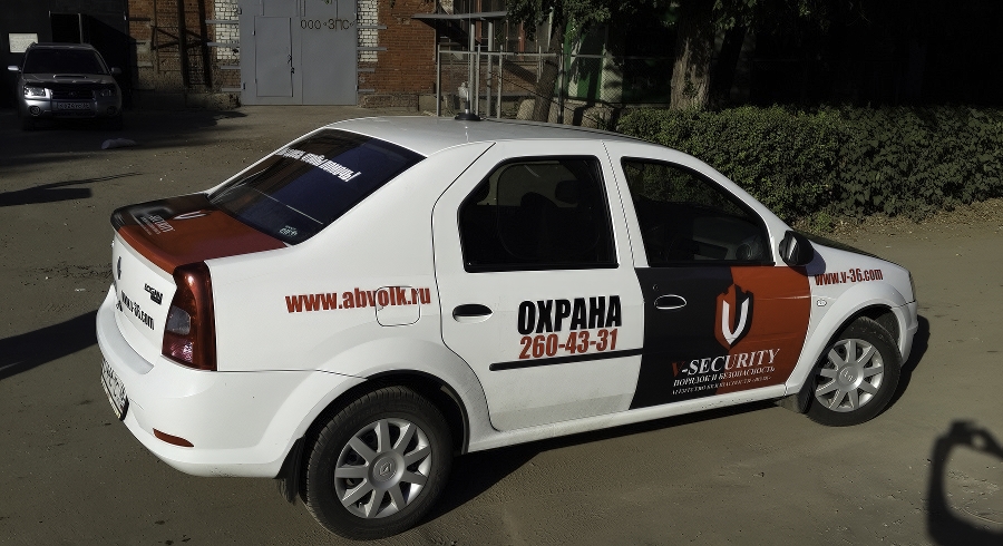 Брендирование легкового автомобиля Renault Logan для охранной компании
